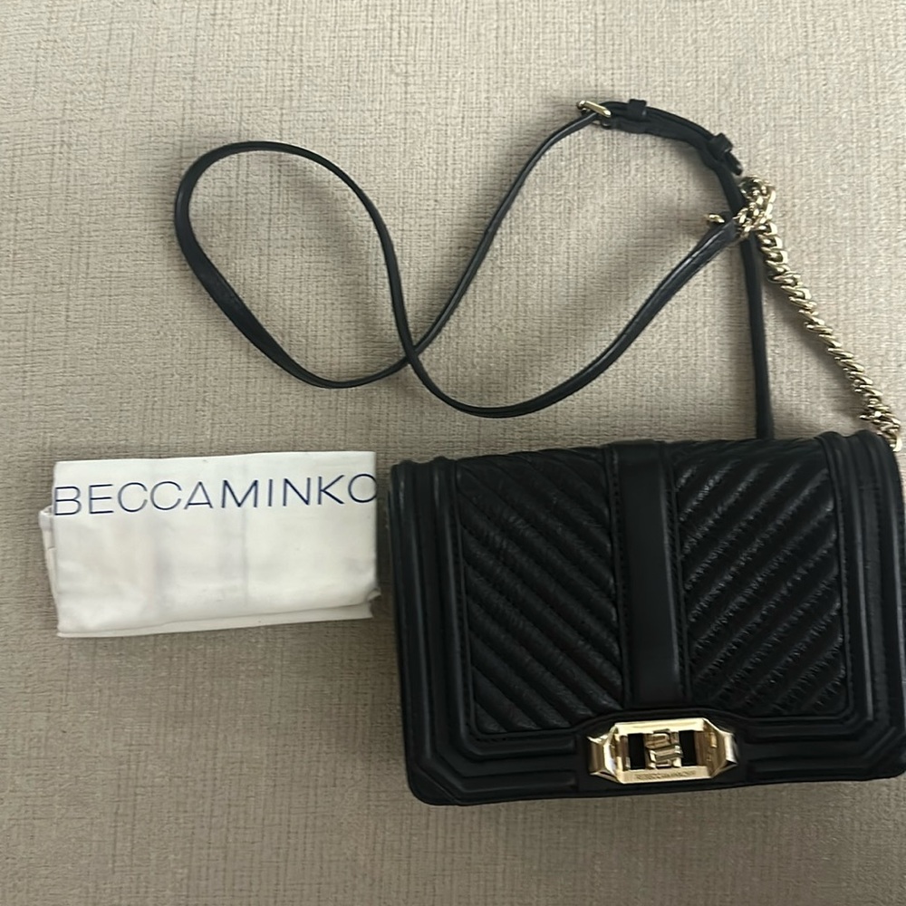 Rebecca Minkoff black cross body bag with gold accents, comes with dust bag.